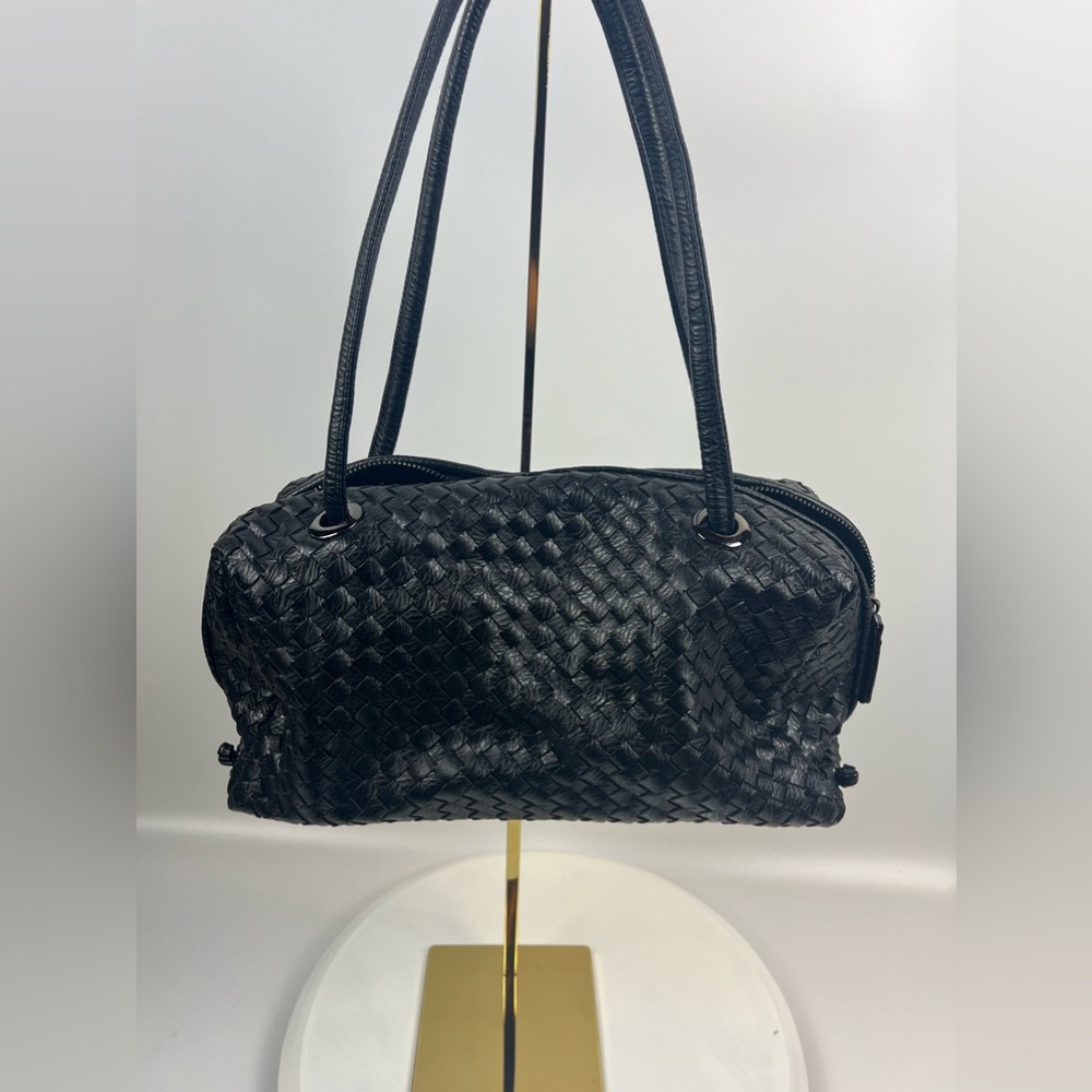 Like new Sandra Roberts squared Black purse.